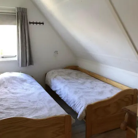 De Wielen 23 Casa de Férias